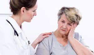 older woman with doctor